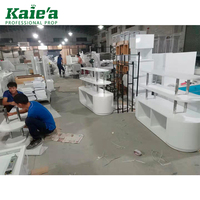 Table de présentation de vêtements en bois MDF à 3 niveaux pour magasin de détail/table de présentation de magasin/table de présentation de chaussures