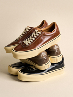 Chaussures de skate rétro en cuir respirant à semelle épaisse unisexe avec logo personnalisé de haute qualité, antidérapantes, décontractées, vente en gros du fabricant