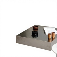 Table basse carrée en acier inoxydable poli miroir, structure monobloc, style moderne et minimaliste, durable, pour salon