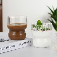 Joli pot en verre de tasse de café de lait de conception moderne pour le jus froid de boissons