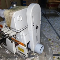 Machine à coudre industrielle à moteur à dix vitesses JUKIS 747F d'occasion avec 4500 points/min et une épaisseur de 11 mm pour l'industrie textile et du vêtement