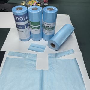 Guarddent rotoli di bavaglino dentale a 2 strati | Carta e pellicola composita per protezione impermeabile superiore | Usa e getta per cliniche - Product Image 2
