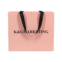 Boutique Sac en papier cadeau rose ivoire mini sac à provisions de luxe avec nœud en ruban pour chaussettes noir et rose