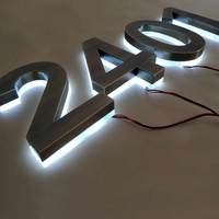 Enseigne lumineuse personnalisée pour hall d'hôtel, logo de marque en acier inoxydable à effet halo, rétroéclairée par LED 3D avec transformateur, pour publicité