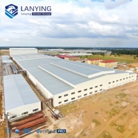 Atelier à structure en acier de conception intelligente avec système de ventilation avancé et isolation thermique pour une fabrication efficace