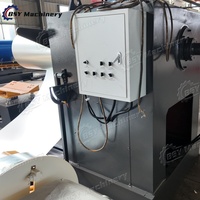 Machine de formage à froid entièrement automatique à grande vitesse pour la production de revêtements de sol en acier avec entraînement par chaîne métallique