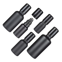 Vente en gros de flacons de parfum à bille 5ml/10ml/15ml/20ml/30ml/50ml/100ml Flacon en verre noir mat à bille