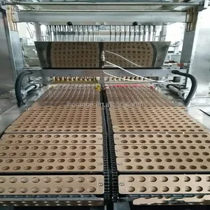 La caramella di lecca-lecca dolce dura completamente automatica fa la linea di produzione di fabbricazione di Bonbon