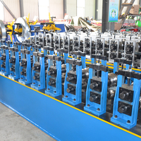 Machine de formage à rouleaux automatique pour profilés de portes de garage à enroulement, machine de fabrication de lames de portes enroulables