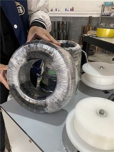 Máquina de embalaje de envoltura de película elástica de bobinado de alambre de <span class=keywords><strong>cobre</strong></span> de bobina de anillo O de embalaje de tubería automática Horizontal multifunción - Product Image 5