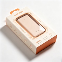 Boîtier de batterie externe personnalisé avec logo, couleur crème, fenêtre transparente, 20000 mAh haute capacité, impression à pois, double sortie Type-C, emballage avec languette de suspension