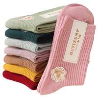 Chaussettes mi-mollet décontractées pour femmes, personnalisées OEM, couleur unie, épaisses, avec logo imprimé, chaudes en coton, vente en gros, automne-hiver