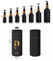 Flacons compte-gouttes en verre cosmétique pour huiles essentielles de 20 ml et tube en papier noir personnalisé
