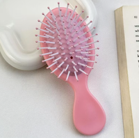 Nouveau peigne coussin d'air en peluche en forme de monstre. Peigne mignon au charme féminin. Doux et délicat. Mini peigne portable.