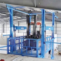 Plateforme élévatrice hydraulique personnalisée de 1 à 5 tonnes pour entrepôt, avec rails de guidage et deux plateformes de levage simples