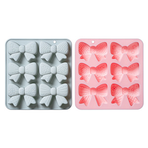 Moldes de Silicona Antiadherentes con Diseño de Lazo, Reutilizables, de Grado Alimenticio, Lindos Moldes Magnéticos de Silicona para Chocolate, Dulces y Hielo - Product Image 1