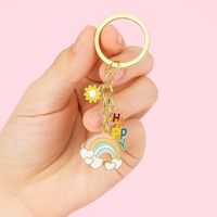 Porte-clés multi-breloques avec lettres, arc-en-ciel, nuage et marguerite, slogan joyeux, breloque de sac douce et féminine, cadeau inspirant
