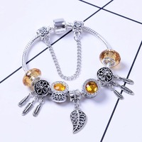 Bracelet en alliage doré avec perles de cristal, opale, attrape-rêves et feuille ajourée pour femme et couple
