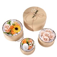 Boîte ronde en papier kraft esthétique de luxe avec estampage de logo personnalisé pour arrangements floraux haut de gamme