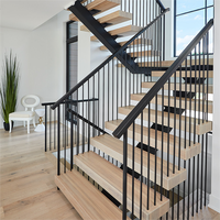 Escalier monodirectionnel design à l'aspect flottant avec structure en acier et marches en bois pour intérieur moderne