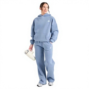 Ensemble assorti décontracté 2 pièces pour femme : sweat à capuche en polaire bleu clair et pantalon de survêtement ample longueur pleine - Product Image 1
