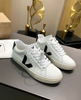 Chaussures basses décontractées en cuir noir et blanc de style marque de luxe, respirantes, à lacets, pour les trajets quotidiens