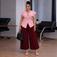 Ensemble haut et pantalon ample décontracté style africain grande taille col en V couleur unie en polyester pour femme – Collection été 2026