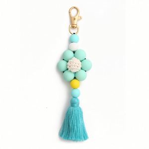Porte-clés à pompon en silicone tressé avec perles florales pour femme, motif chien et panda, breloque de sac, vente chaude - Product Image 5