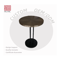 Table basse ronde moderne de luxe avec plateau en laiton et acier inoxydable noir pour la maison ou l'hôtel