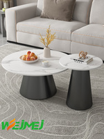 Ensemble de table basse ronde moderne en pierre frittée et base métallique de luxe avec hauteur réglable pour salon