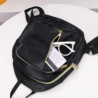 Mini sac à dos en nylon léger petit sac de jour pour les femmes noir étanche décontracté école Style petite fille sac