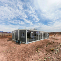 Maison conteneur modulaire détachable personnalisable avec conception de ventilation moderne pour bureaux commerciaux et résidentiels, bars et gîtes