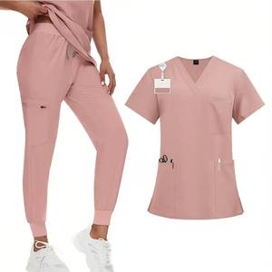 Uniformes Quirúrgicos de Enfermería con Estampado OEM, Estilo Nuevo, Colores para Hospitales y Salones de Belleza, Conjuntos Unisex Holgados y Transpirables - Product Image 1
