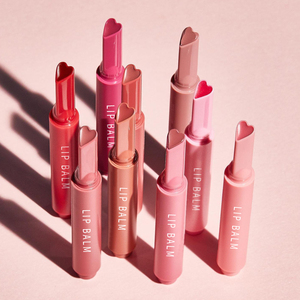 ลิปสติกแบบแท่งสีชมพูรูปหัวใจ ยี่ห้อส่วนตัว ไม่เหนียวเหนอะหนะ ลิปบาล์มแบบมีกลิตเตอร์ ไม่มีโลโก้ ให้ความชุ่มชื้นสูง ลิปบาล์มแบบแท่งเนื้อฉ่ำวาว - Product Image 1