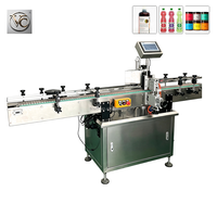 Machine d'étiquetage automatique de bouteilles rondes FKJX avec capteur d'étiquettes pour le collage d'étiquettes sur les bouteilles de jus et de miel