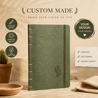 Carnet cadeau personnalisé en papier kraft, couverture rigide A5, 80 feuilles, reliure cousue, finition mate non couchée, pochette à ruban, logo en feuille d'or