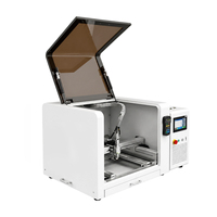Machine de découpe laser à fibre miniature 1200W CNC 4040 pour l'industrie de la bijouterie
