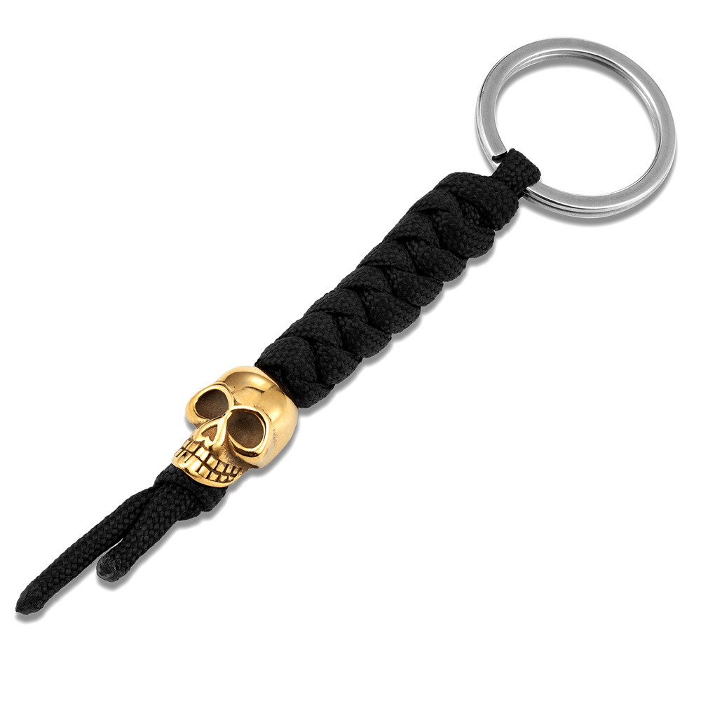 Cuerda negra calavera dorada