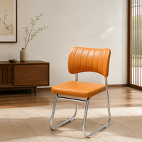 Chaise de salle à manger rembourrée moderne avec structure tubulaire cantilever et dossier nervuré pour cuisine, salle à manger, café et bistrot-bar