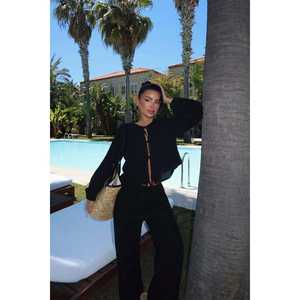 Pantalones de traje negros con cordones para mujer - Product Image 1