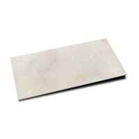 Carrelage de sol en marbre crème 24x48 en porcelaine émaillée polie de luxe pour le salon de la maison
