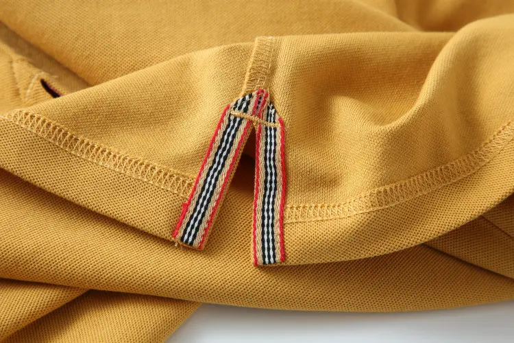 Kaus Polo pria merek Logo musim panas baru kelas atas pakaian polos kasual desainer lengan pendek untuk wanita