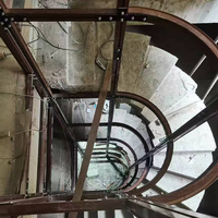 Porte d'ascenseur centrale en acier moderne en forme de fer à cheval pour villa, appartement, hôtel, avec garantie d'un an et conception de modèle 3D