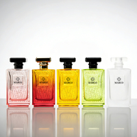 Flacon de parfum en verre plat de luxe MARCO 100ML, bouchon géométrique noir et or, vaporisateur à pompe, emballage en carton sérigraphié, logo personnalisé