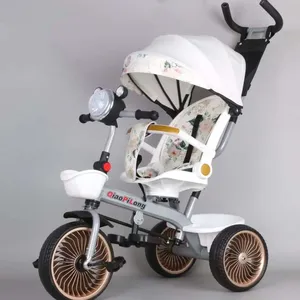 Nueva bicicleta triciclo multifuncional 4 en uno de tres ruedas para niños de 1 a 6 años giratoria y cochecito de bebé con empuje