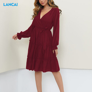 Vente en gros Robe pure à manches longues et ourlet évasé pour femme Robe midi décontractée - Product Image 1