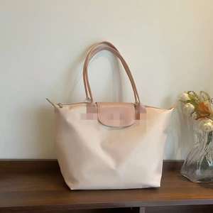 Long-xhonp <span class=keywords><strong>M</strong></span>-formaat mode grote capaciteit waterdichte nylon schoudertas/crossbody tas met letterpatroon voor unisex, draagbaar voor de winter - Product Image 6