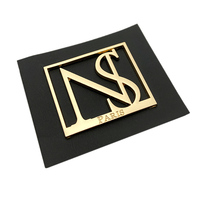Étiquette en cuir métallique personnalisée de haute qualité avec logo en relief pour vêtement