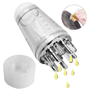 Mini Pettine Elettrico in Silicone per Applicazione su Cuoio Capelluto con Capacità di 6ml per Erogazione Olio Capelli e Massaggiatore a Rullo - Product Image 1