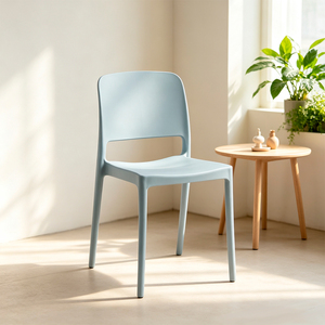Modern Light Blue <b>Plastic</b> <b>Dining</b> <b>Chair</b> with Hollow Back Design Stackable for Home Use - Product Image 1